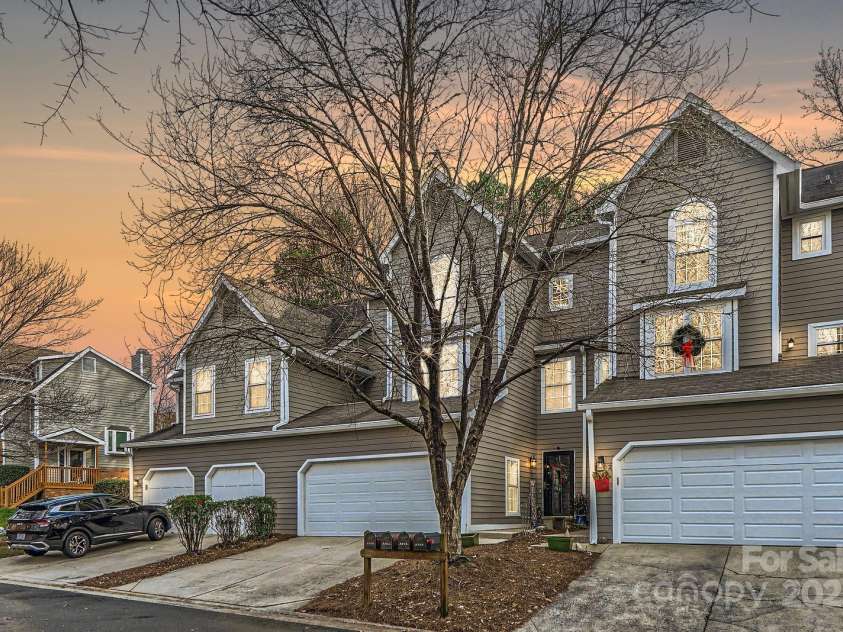 8904 Saint Pierre Lane, Charlotte, NC 28277.  MLS# CAR4233705, YatesRealty ID 5731. Front in the evening