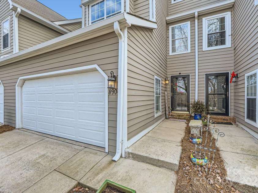 8904 Saint Pierre Lane, Charlotte, NC 28277.  MLS# CAR4233705, YatesRealty ID 5731. Front with garage