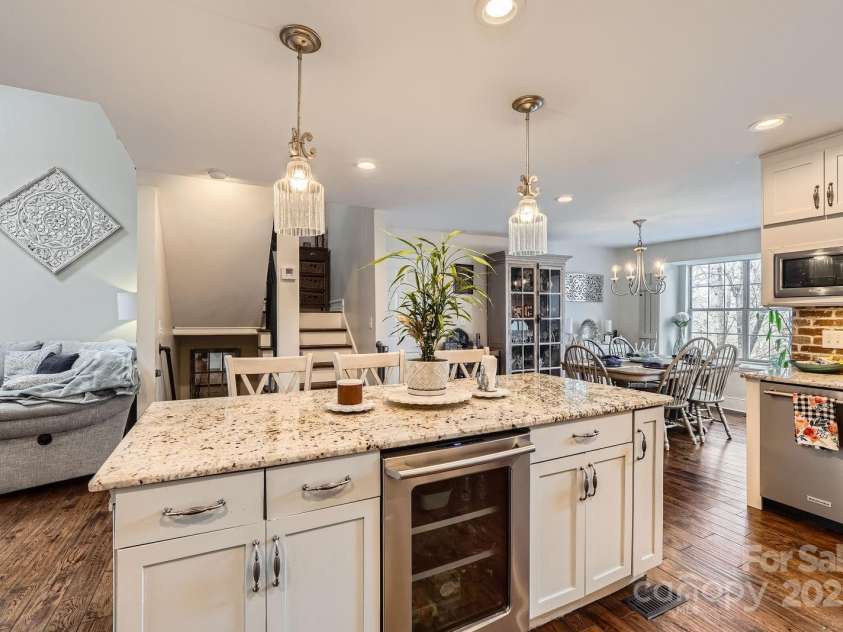 8904 Saint Pierre Lane, Charlotte, NC 28277.  MLS# CAR4233705, YatesRealty ID 5731. Stainless steel appliances and wine fridge