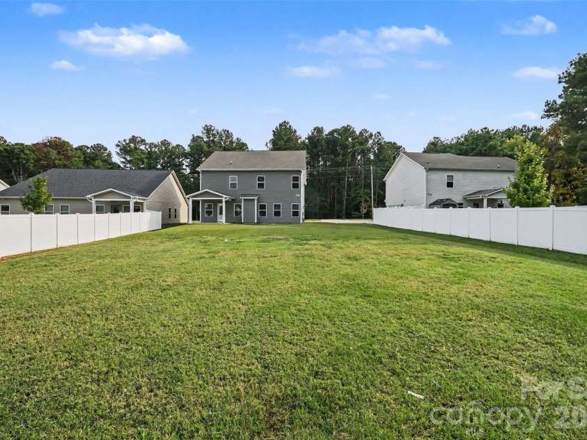14415 Holbrooks Road, Huntersville, NC 28078.  MLS# CAR4433936, YatesRealty ID 57319. Backyard