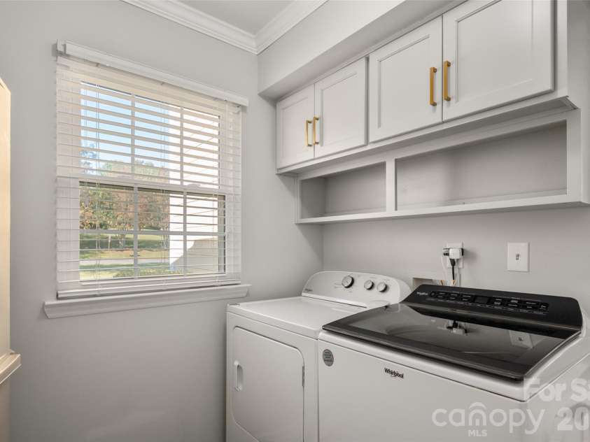 15229 Dartford Lane, Mint Hill, NC 28227.  MLS# CAR4434897, YatesRealty ID 57326. Laundry room