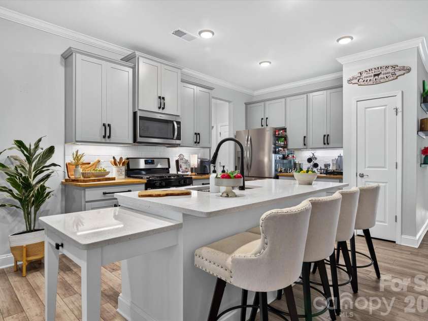4521 Grove Manor Street, Waxhaw, NC 28173.  MLS# CAR4432721, YatesRealty ID 57328. Large kitchen with expansive island