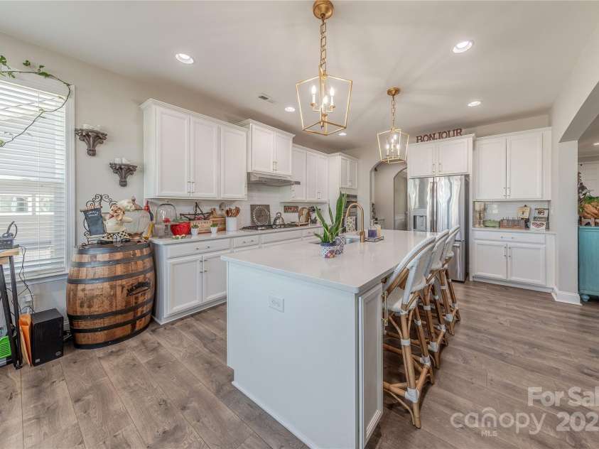 1048 Harbor Bay Drive, Indian Land, SC 29707.  MLS# CAR4231848, YatesRealty ID 5733. Large Dining Island