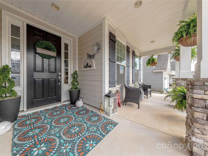 1048 Harbor Bay Drive, Indian Land, SC 29707.  MLS# CAR4231848, YatesRealty ID 5733. Rocking Chair Front Porch