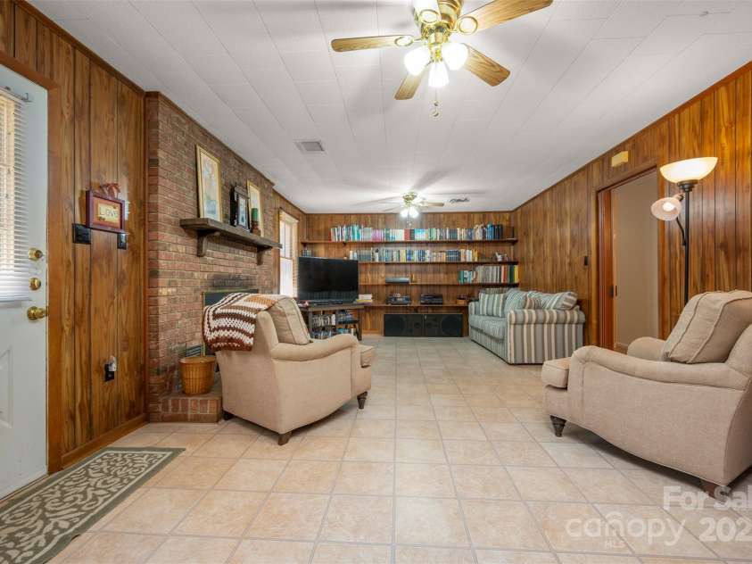 582 County Line Road, Rutherfordton, NC 28139.  MLS# CAR4235377, YatesRealty ID 5734. Den w/fireplace