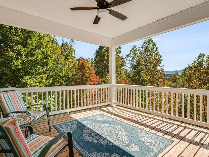 76 Rose Creek Road, Leicester, NC 28748.  MLS# CAR4430015, YatesRealty ID 57341. Covered & private back deck