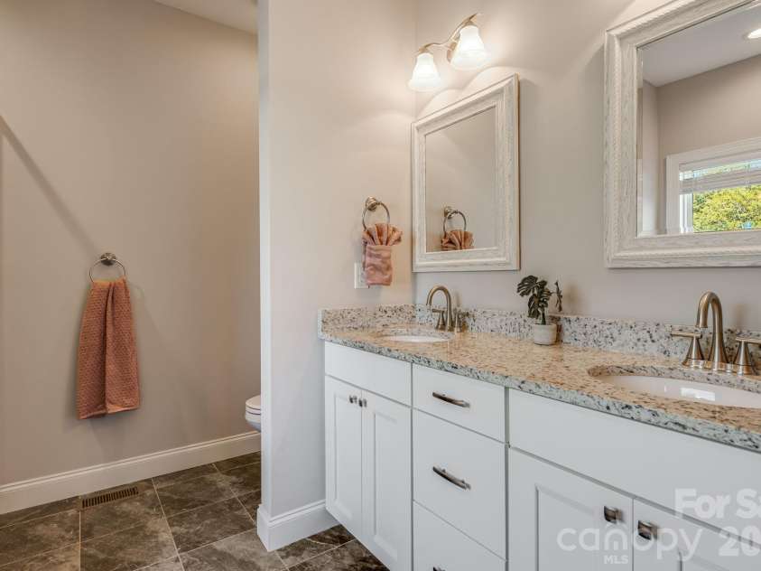 76 Rose Creek Road, Leicester, NC 28748.  MLS# CAR4430015, YatesRealty ID 57341. Primary Bathroom