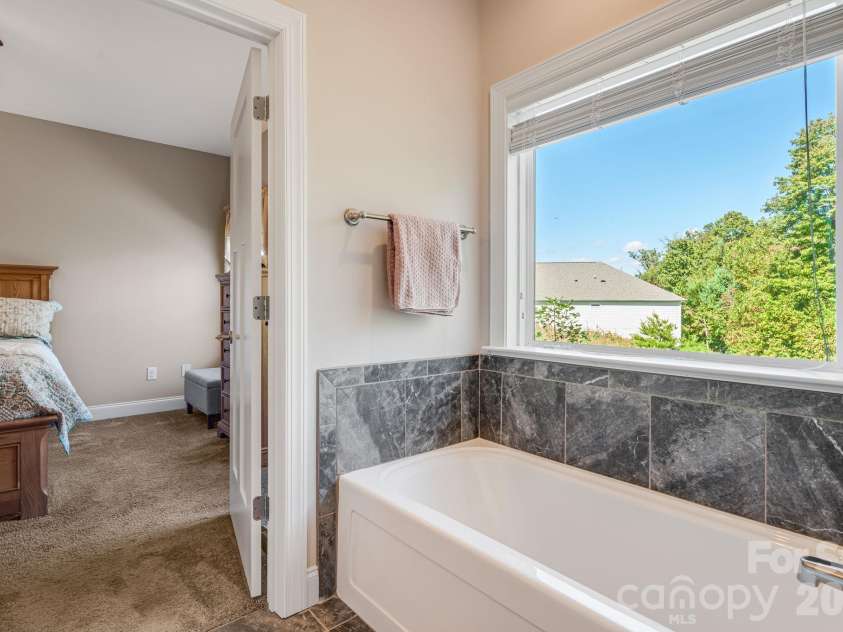76 Rose Creek Road, Leicester, NC 28748.  MLS# CAR4430015, YatesRealty ID 57341. Primary en-Suite