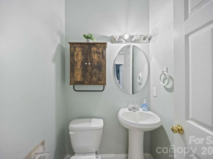 511 Zion Street, Landis, NC 28088.  MLS# CAR4433896, YatesRealty ID 57342. Half bath downstairs