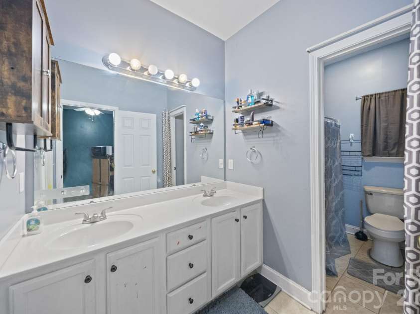 511 Zion Street, Landis, NC 28088.  MLS# CAR4433896, YatesRealty ID 57342. Primary bathroom