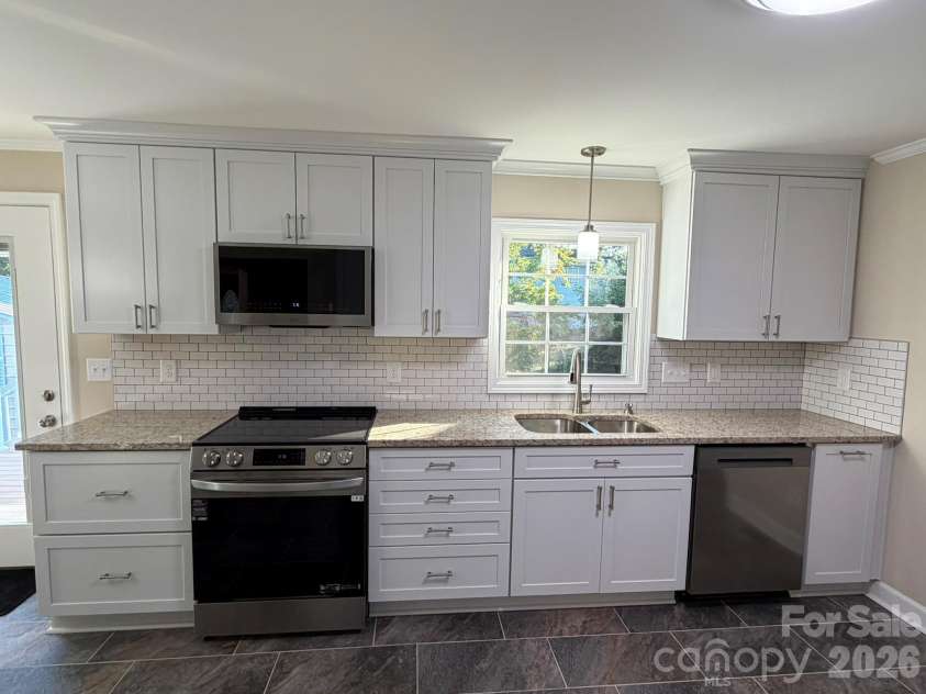 204 General J E Johnston Street, Stanley, NC 28164.  MLS# CAR4435603, YatesRealty ID 57343. 
