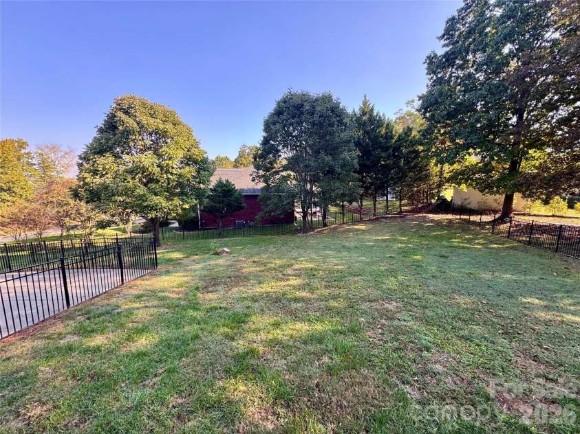 7101 Founders Way, Harris, NC 28075.  MLS# CAR4435546, YatesRealty ID 57347. Fenced portion of the back yard