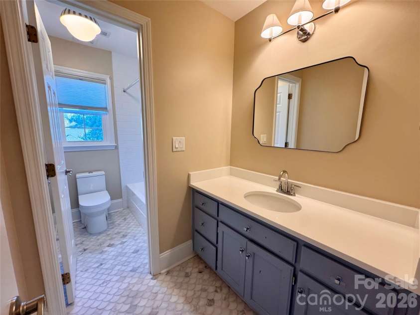 7101 Founders Way, Harris, NC 28075.  MLS# CAR4435546, YatesRealty ID 57347. Hall bath-Vanity is separate from the tub/shower and toilet so sharing this bath is a breeze.