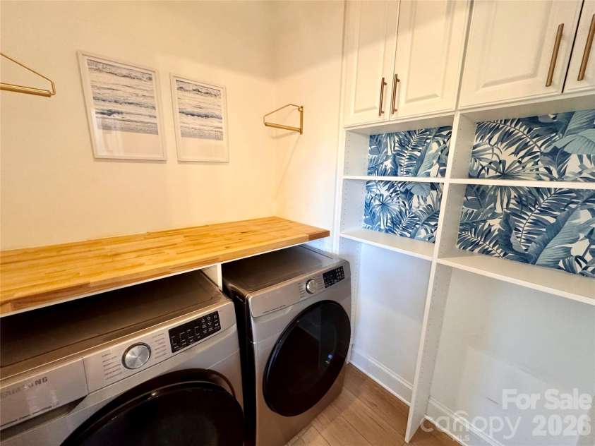 7101 Founders Way, Harris, NC 28075.  MLS# CAR4435546, YatesRealty ID 57347. Laundry room with the cutest design details. Washer/dryer convey.