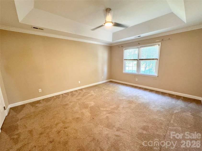 7101 Founders Way, Harris, NC 28075.  MLS# CAR4435546, YatesRealty ID 57347. Primary bedroom with tray ceiling
