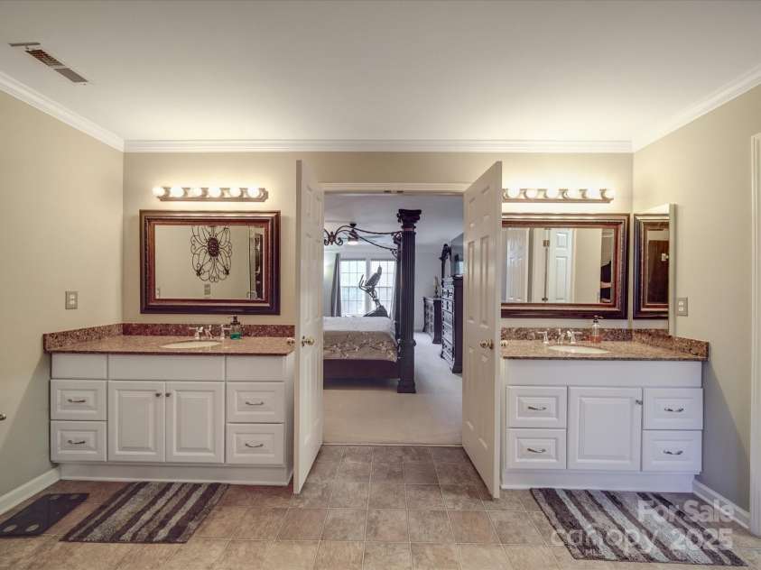 9001 Fenwick Drive, Indian Trail, NC 28079.  MLS# CAR4246344, YatesRealty ID 5737. Primary Bathroom