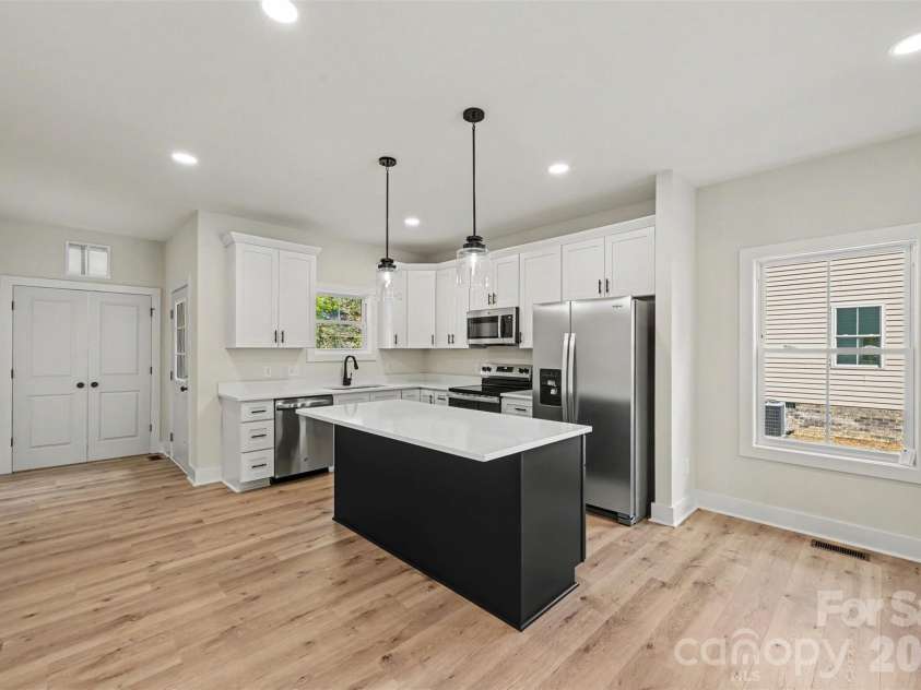 910 8th Street, Kannapolis, NC 28081.  MLS# CAR4426631, YatesRealty ID 57377. Kitchen with quartz countertops