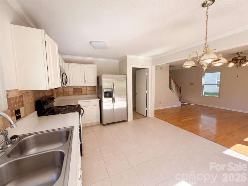 6807 Wandering Creek Drive, Charlotte, NC 28216.  MLS# CAR4435743, YatesRealty ID 57378. 