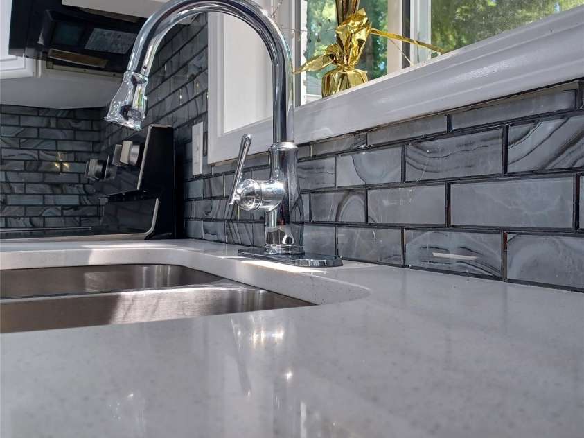 5717 Ruth Drive, Charlotte, NC 28215.  MLS# CAR4435760, YatesRealty ID 57388. Beautiful countertops with undermount stainless sink