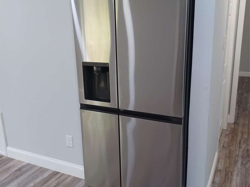 5717 Ruth Drive, Charlotte, NC 28215.  MLS# CAR4435760, YatesRealty ID 57388. Built in LG Refrigerator