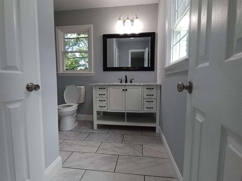 5717 Ruth Drive, Charlotte, NC 28215.  MLS# CAR4435760, YatesRealty ID 57388. Fully Updated Primary Bath