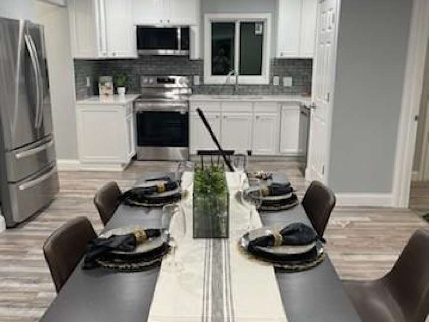 5717 Ruth Drive, Charlotte, NC 28215.  MLS# CAR4435760, YatesRealty ID 57388. Generous Set of Canister lights