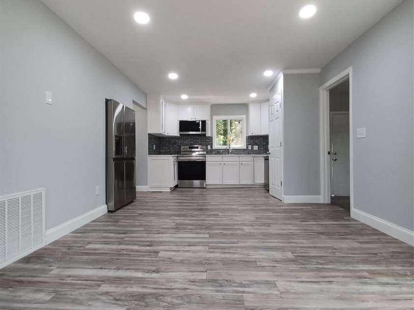 5717 Ruth Drive, Charlotte, NC 28215.  MLS# CAR4435760, YatesRealty ID 57388. Spacious Kitchen Dining Combination measures 12 x 24