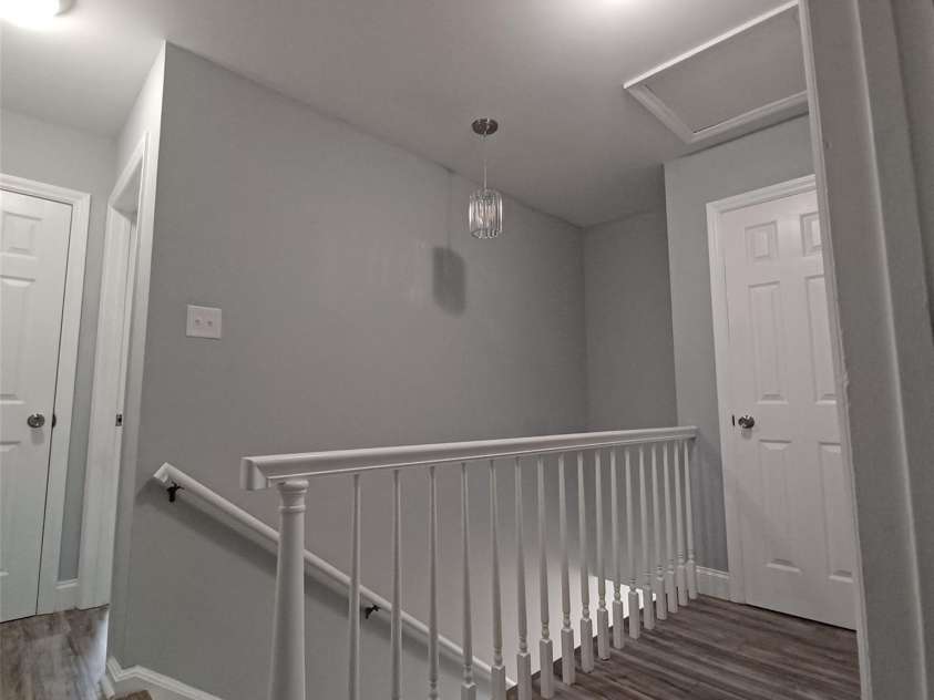 5717 Ruth Drive, Charlotte, NC 28215.  MLS# CAR4435760, YatesRealty ID 57388. Stairway leading to front entry