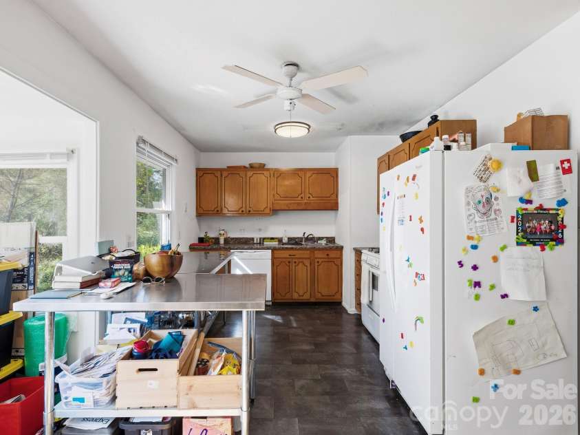 239 Baird Cove Road, Asheville, NC 28804.  MLS# CAR4434380, YatesRealty ID 57389. Looking at kitchen from breakfast area