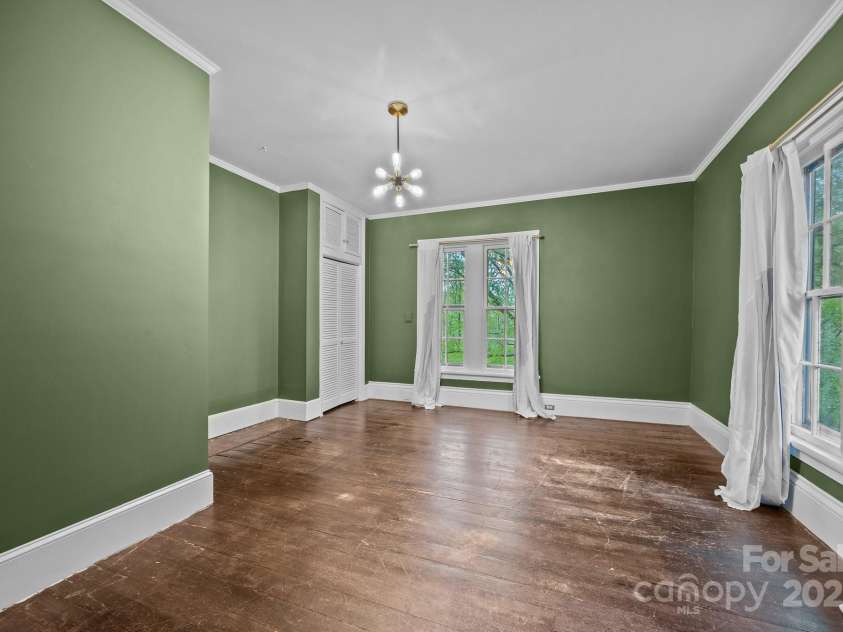 740 Woodlawn Avenue, Mount Holly, NC 28120.  MLS# CAR4244621, YatesRealty ID 5739. It is believed that there was a fireplace in here but it was covered up or removed upon installation of the full bathroom.  The current owners were planning to refinish and install a mantle that was left with the home