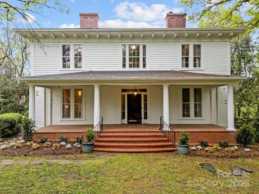 740 Woodlawn Avenue, Mount Holly, NC 28120.  MLS# CAR4244621, YatesRealty ID 5739. The Johnston-Nims House (also locally referred to as The Spratt House) was originally built in the 1820's as a 2-story Federal Style house, on 400 acres of land in an area known as Woodlawn (now Mt. Holly).