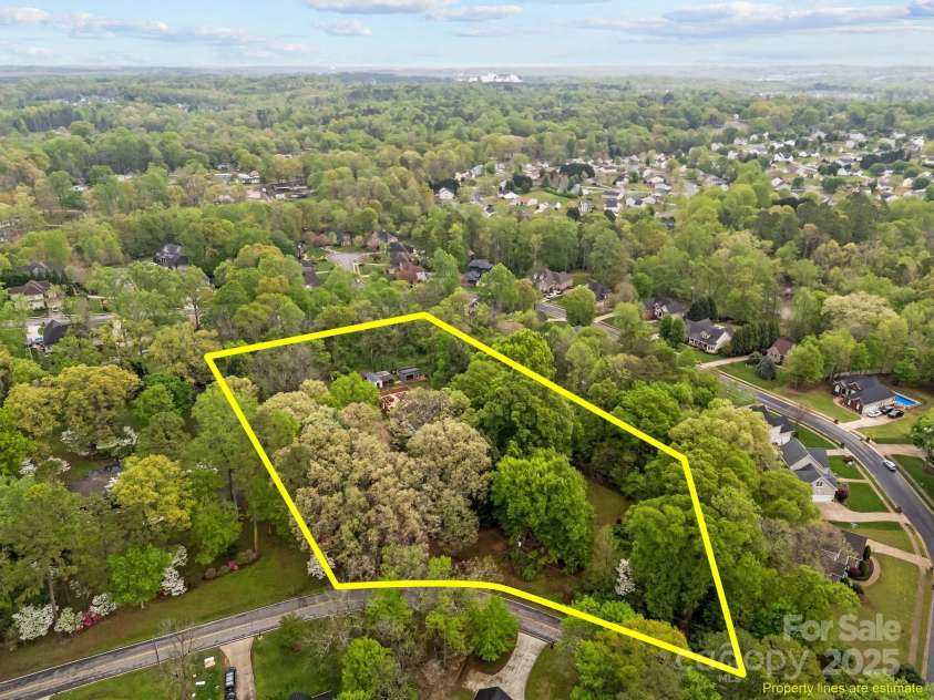 740 Woodlawn Avenue, Mount Holly, NC 28120.  MLS# CAR4244621, YatesRealty ID 5739. The lot is over 4 acres!