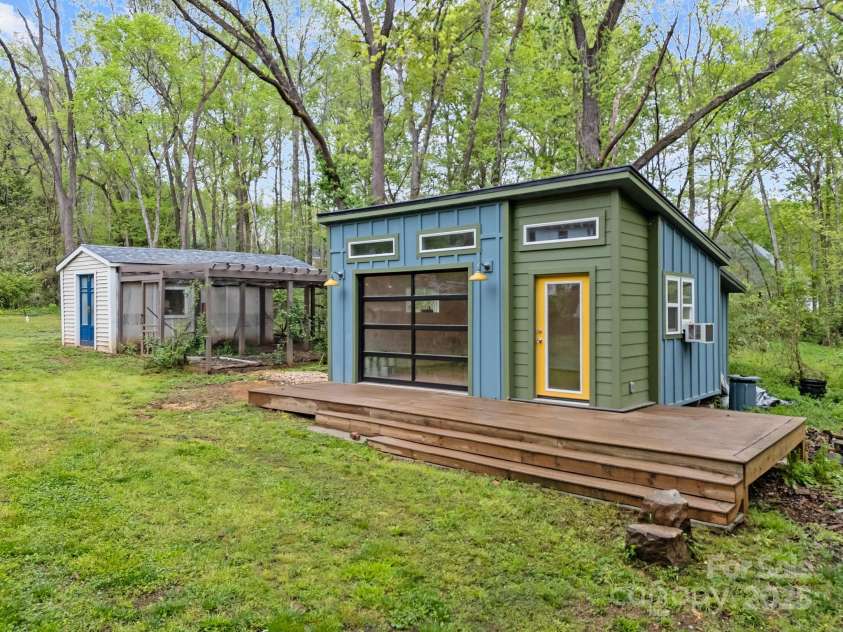 740 Woodlawn Avenue, Mount Holly, NC 28120.  MLS# CAR4244621, YatesRealty ID 5739. The modern outbuilding and attached deck do not convey with the sale of the home, however, the current owners would be happy to sell it for an additional price.  They have over $30k invested in it but will entertain o