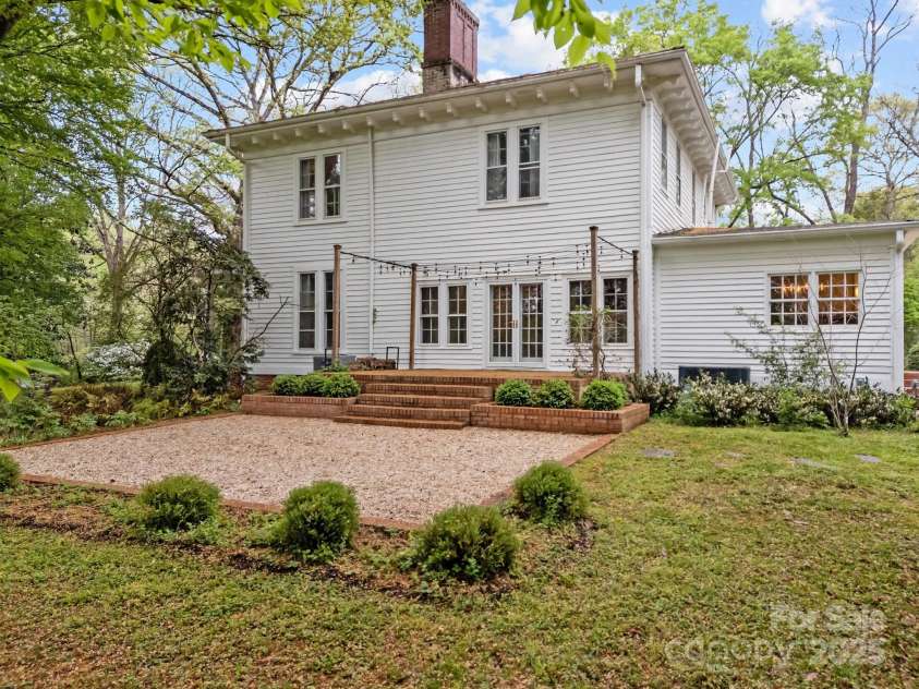 740 Woodlawn Avenue, Mount Holly, NC 28120.  MLS# CAR4244621, YatesRealty ID 5739. The side porch and gravel patio both added by current owners