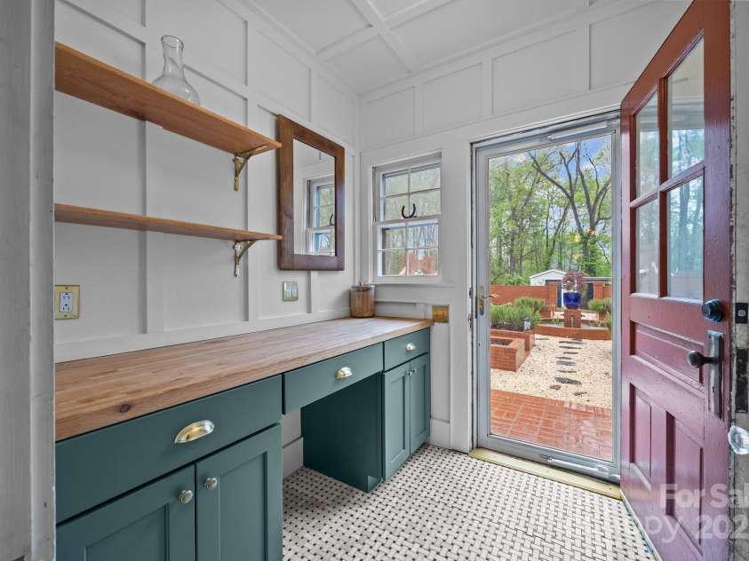 740 Woodlawn Avenue, Mount Holly, NC 28120.  MLS# CAR4244621, YatesRealty ID 5739. This is the mud room with access to the formal raised bed garden.