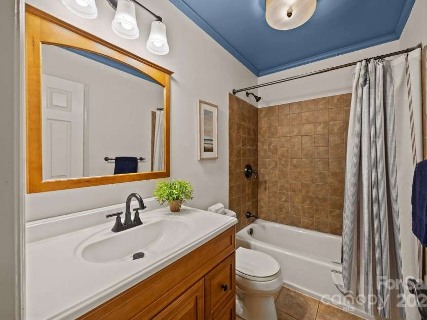 740 Woodlawn Avenue, Mount Holly, NC 28120.  MLS# CAR4244621, YatesRealty ID 5739. Upstairs full bath is between the two secondary bedrooms and is accessible from the hallway.