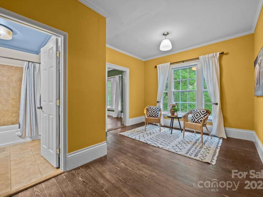 740 Woodlawn Avenue, Mount Holly, NC 28120.  MLS# CAR4244621, YatesRealty ID 5739. Upstairs sitting area between the bedrooms (in today's home terms we'd call it the loft).