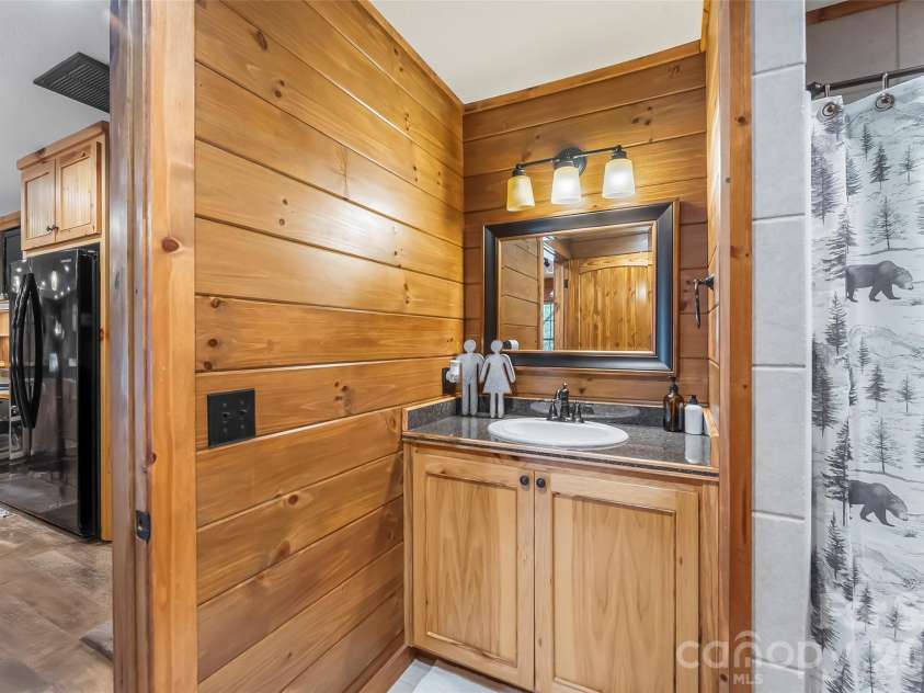 410 Timberland Drive, Marion, NC 28752.  MLS# CAR4435762, YatesRealty ID 57390. Basement full bath