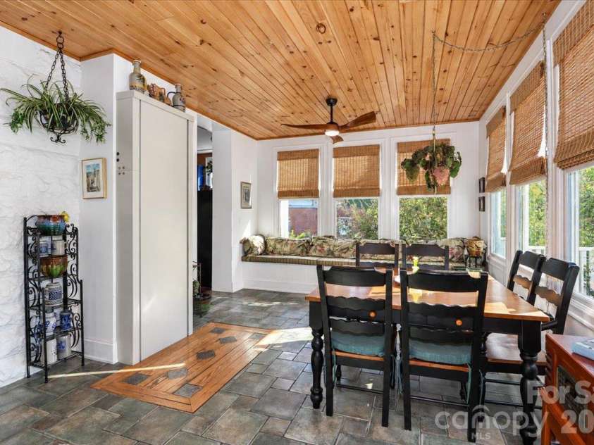 403 Front Street, Statesville, NC 28677.  MLS# CAR4430672, YatesRealty ID 57391. Sunroom with Elevator to Basement Garage