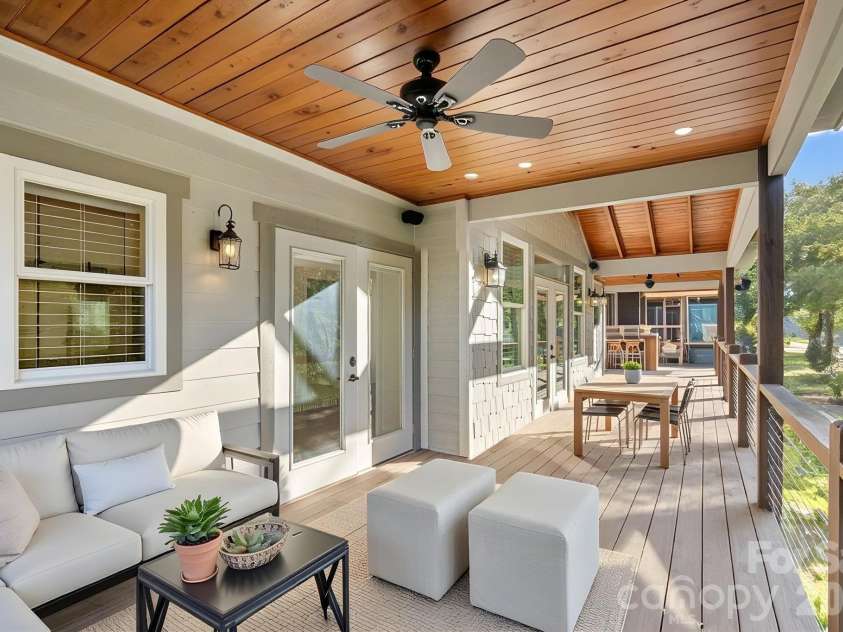 1333 Riverside Drive, Charlotte, NC 28214.  MLS# CAR4431741, YatesRealty ID 57404. Extensive covered deck  (Virtually Staged)
