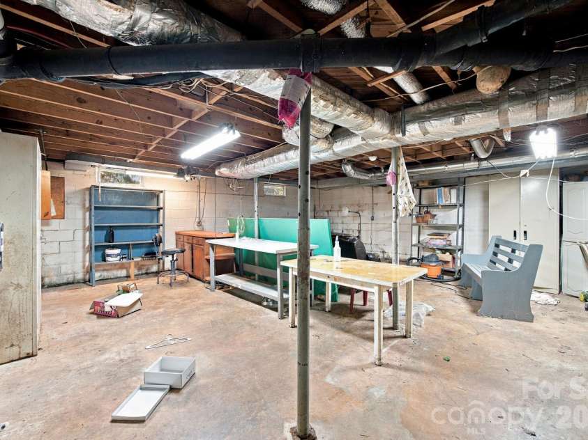816 Central Avenue, Locust, NC 28097.  MLS# CAR4435834, YatesRealty ID 57419. Basement