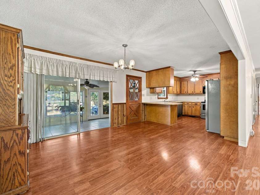 816 Central Avenue, Locust, NC 28097.  MLS# CAR4435834, YatesRealty ID 57419. Dining room