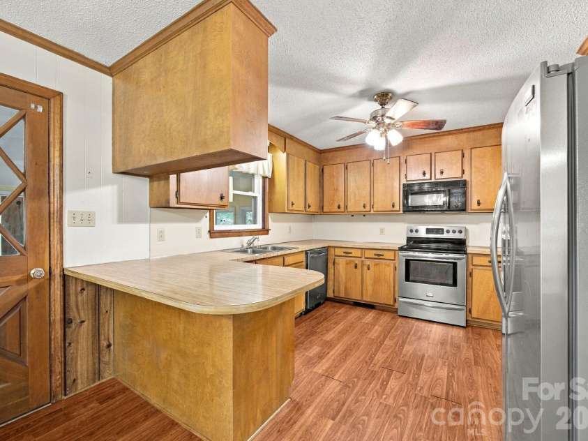 816 Central Avenue, Locust, NC 28097.  MLS# CAR4435834, YatesRealty ID 57419. Kitchen