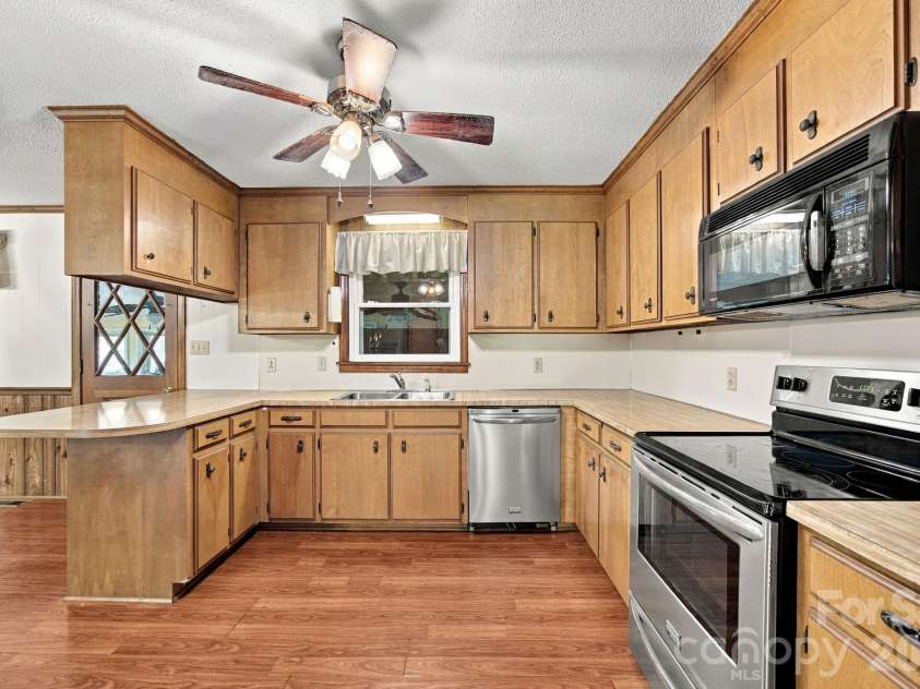 816 Central Avenue, Locust, NC 28097.  MLS# CAR4435834, YatesRealty ID 57419. Kitchen