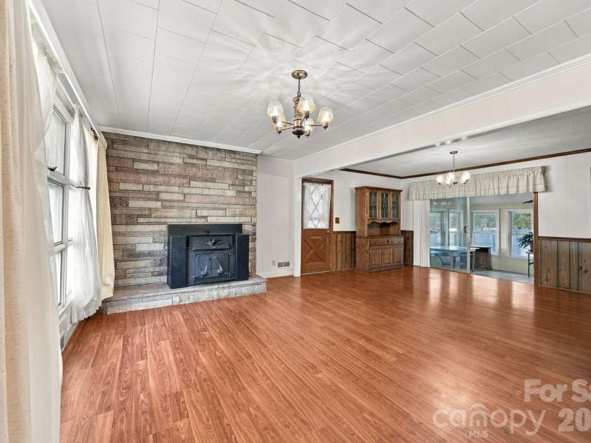 816 Central Avenue, Locust, NC 28097.  MLS# CAR4435834, YatesRealty ID 57419. Living room