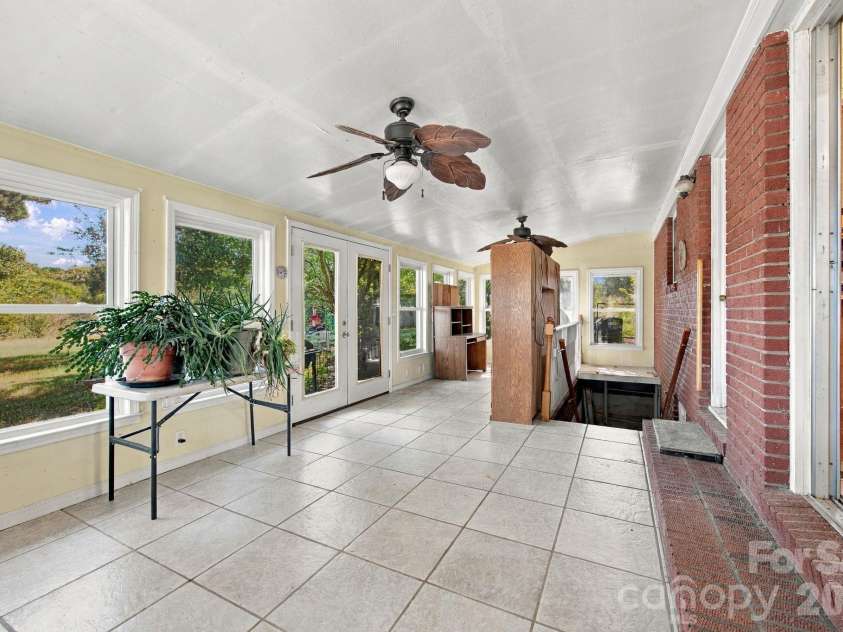 816 Central Avenue, Locust, NC 28097.  MLS# CAR4435834, YatesRealty ID 57419. Sunroom