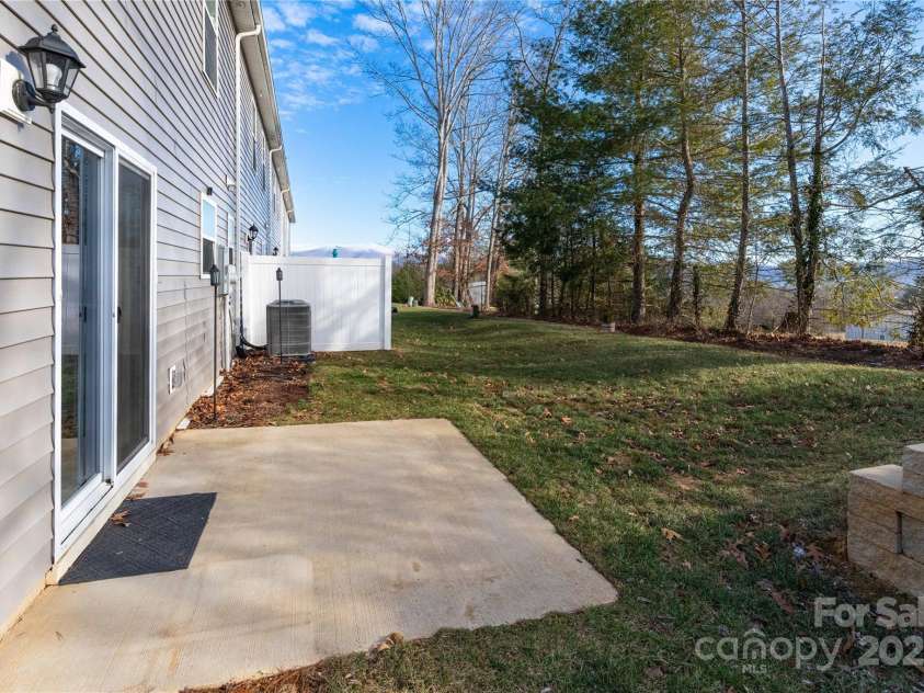 103 Gregory Court, Weaverville, NC 28787.  MLS# CAR4211989, YatesRealty ID 5745. Back patio