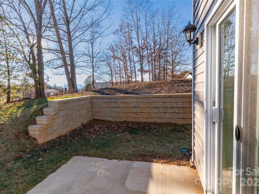103 Gregory Court, Weaverville, NC 28787.  MLS# CAR4211989, YatesRealty ID 5745. Back patio area