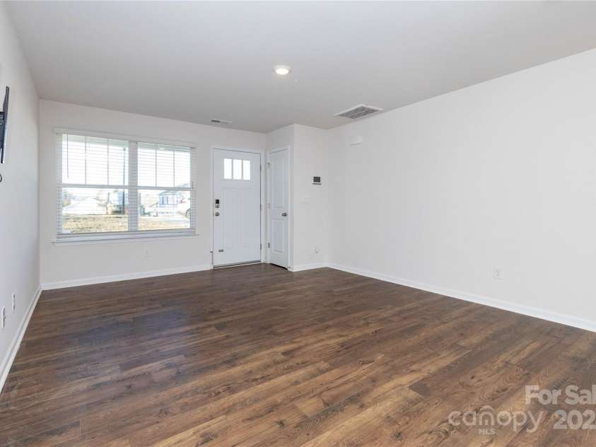 103 Gregory Court, Weaverville, NC 28787.  MLS# CAR4211989, YatesRealty ID 5745. Front entrance into living room