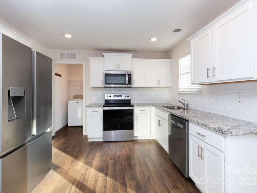 103 Gregory Court, Weaverville, NC 28787.  MLS# CAR4211989, YatesRealty ID 5745. Granite counters and stainless steel appliances